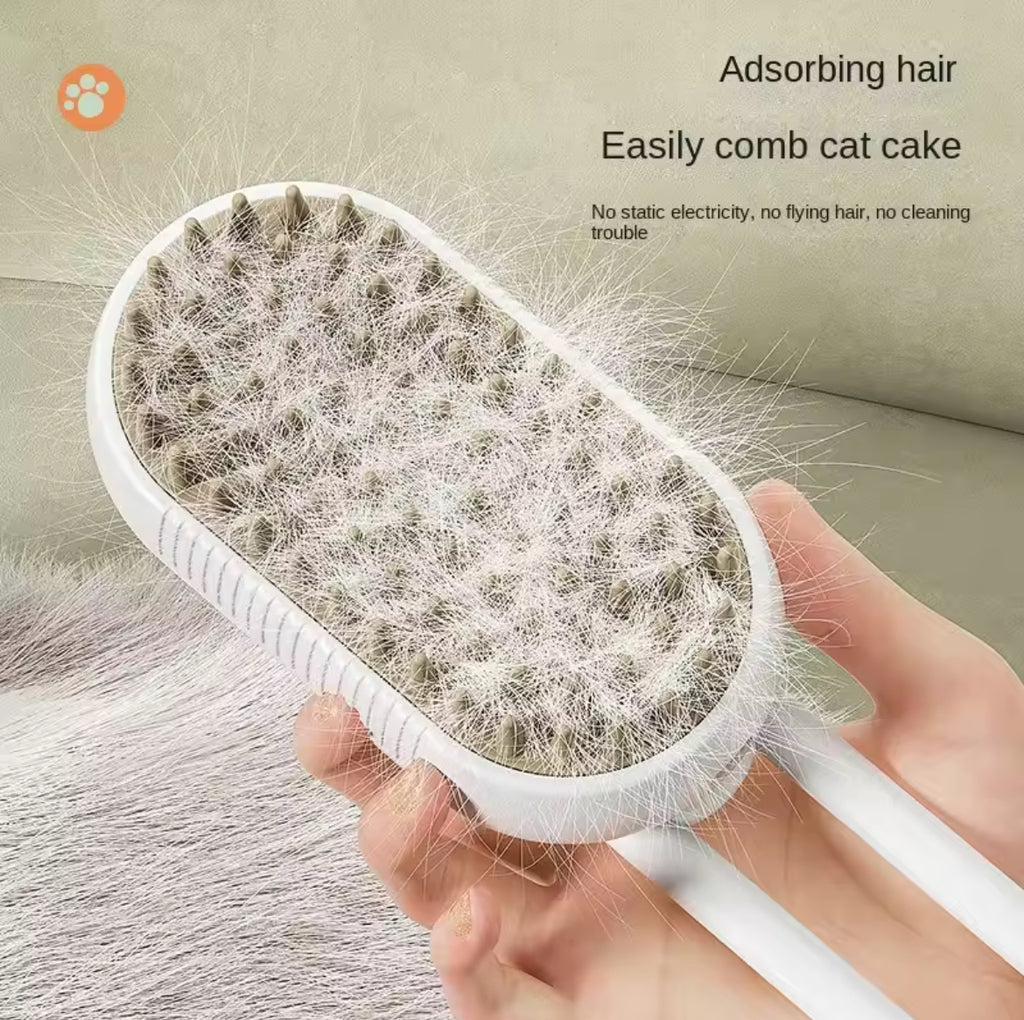 Steamy pet brush